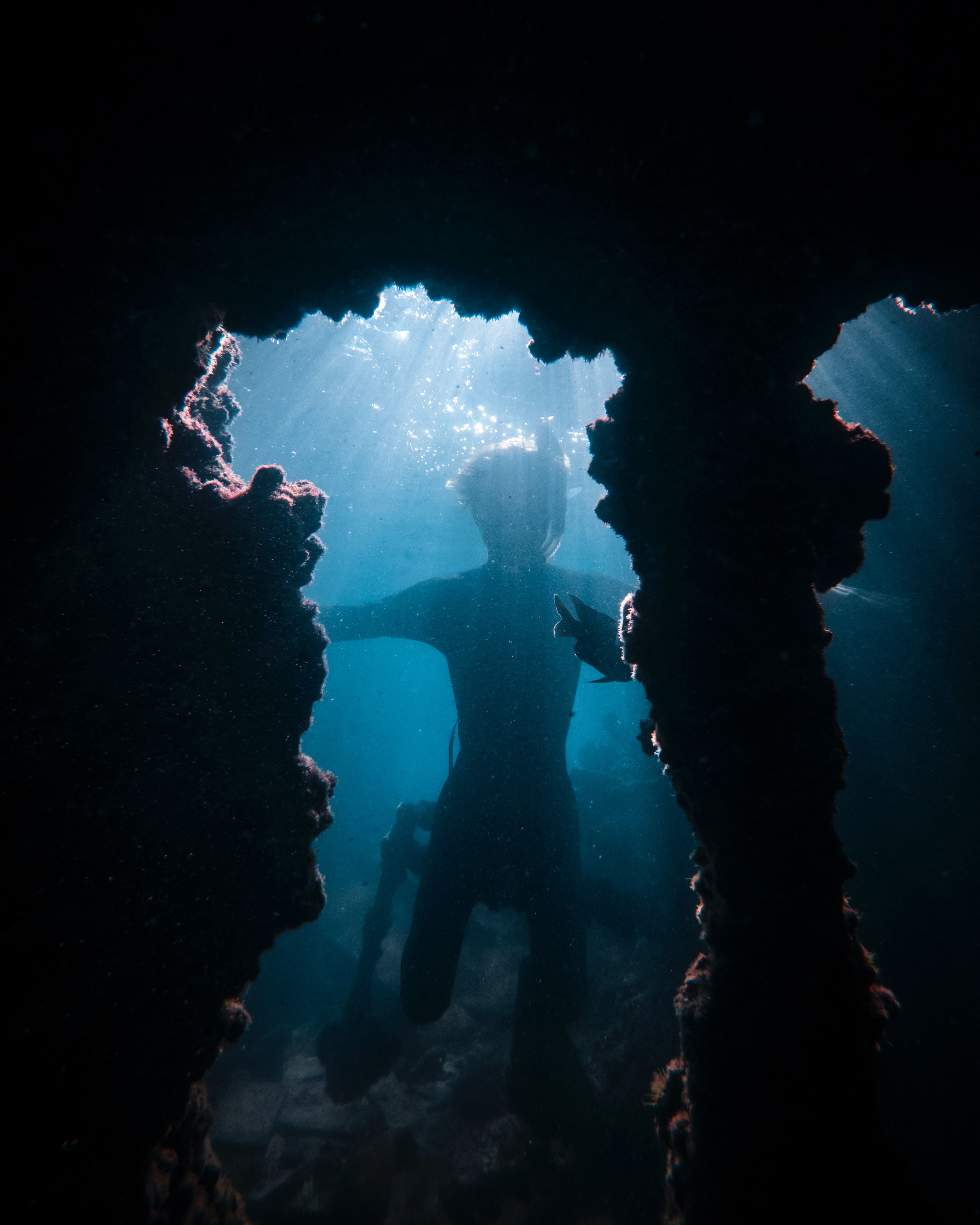 Diver cave entrance underwater diving