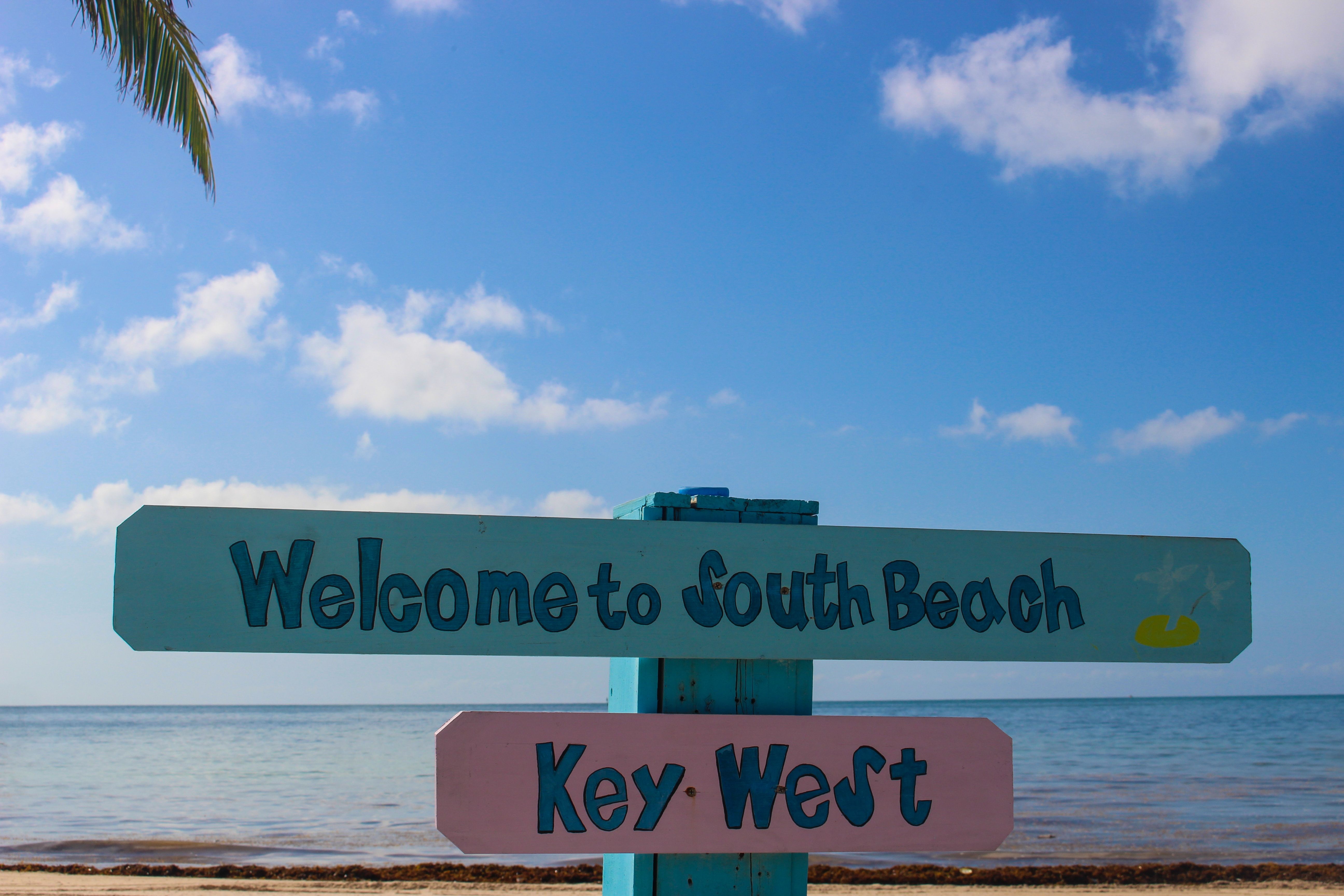 Key West sign at the beach.