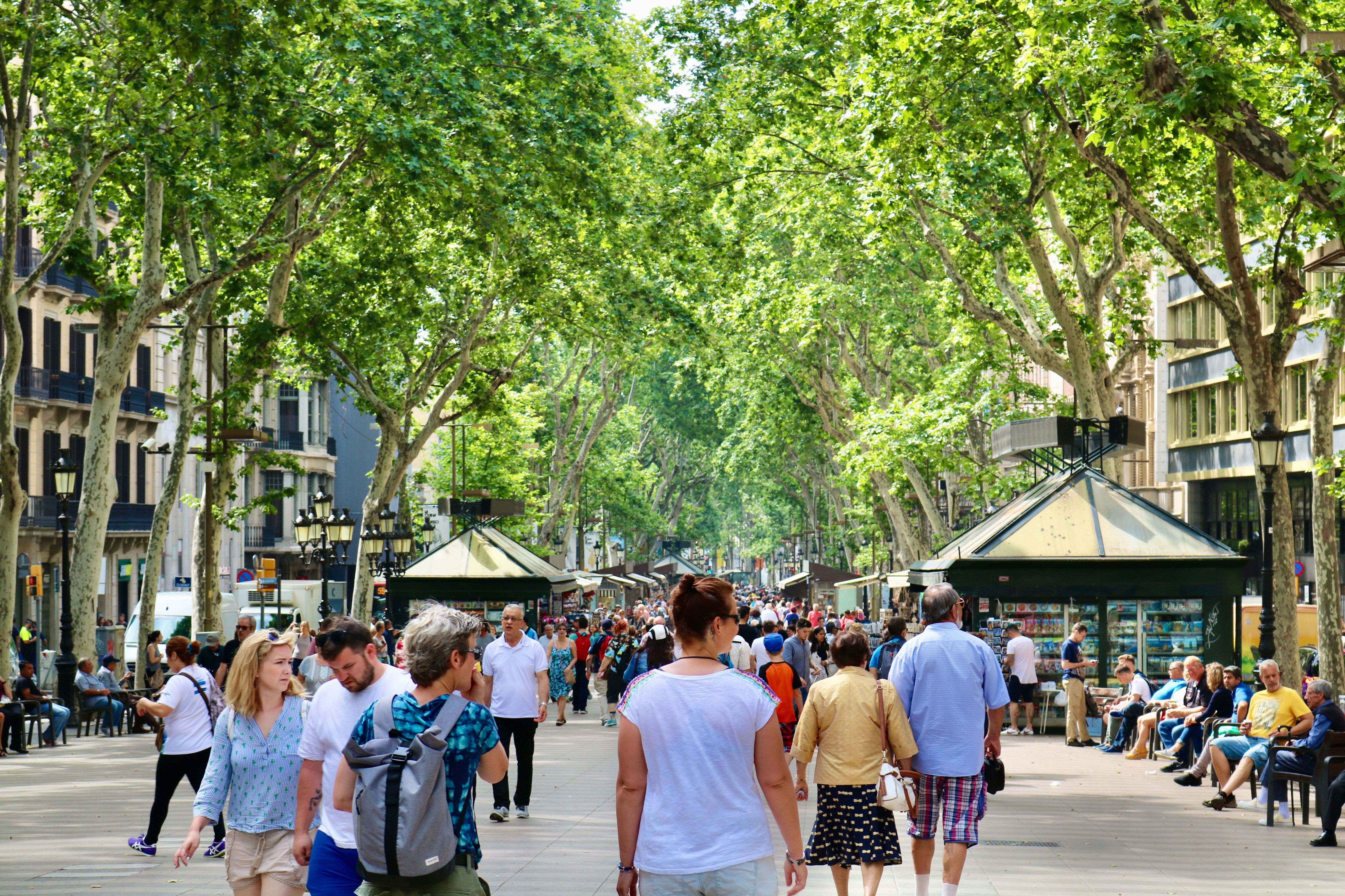 People walking down a busy Barcelona street