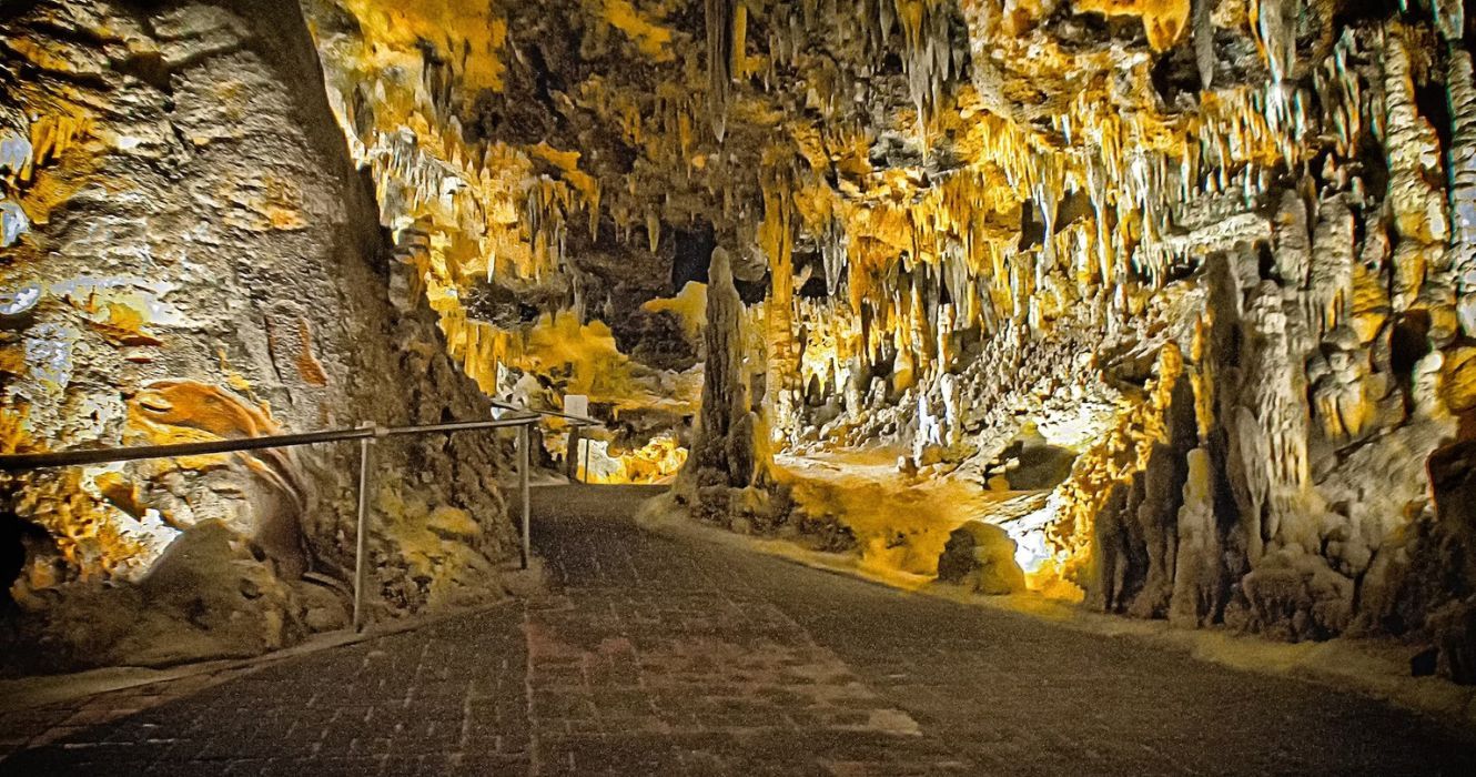 a walkway through rock formations in Luray Caverns