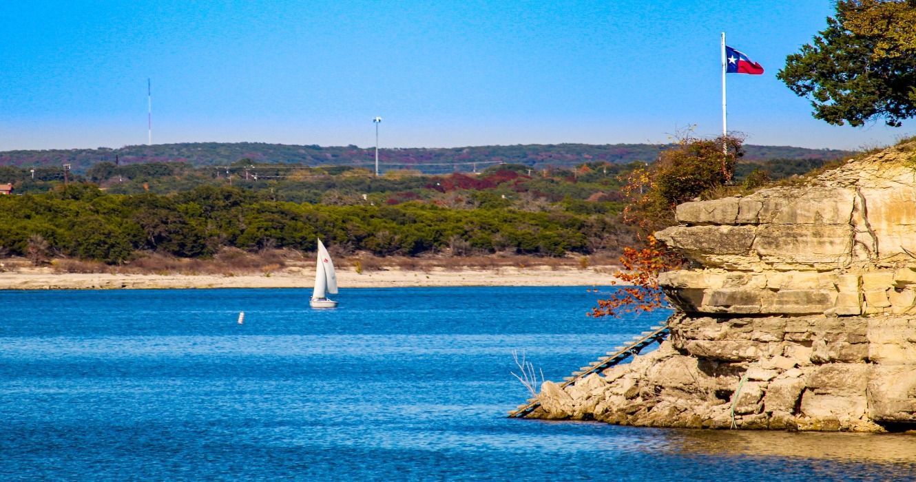 A sailbot sailing on Lake Travis on a sunny day in Texas, USA