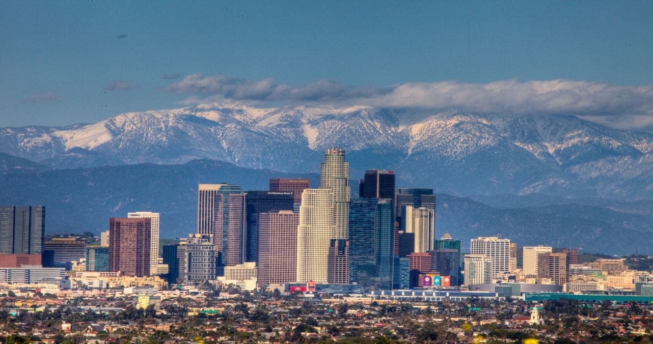 The skyline of downtown LA, California, with mountains in the background