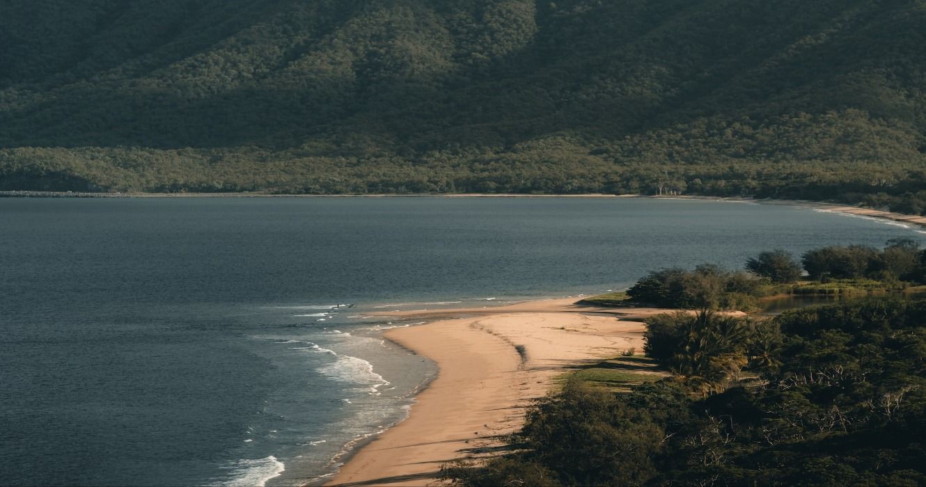 An aerial view of a beach in Port Douglas Queensland, Australia