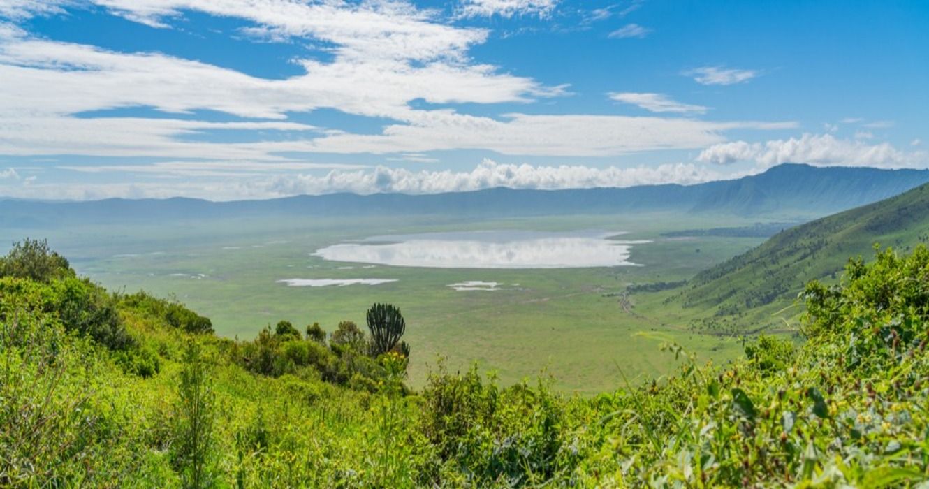 A scenic view over Ngorongoro Conservation Area, where Ngorongoro Crater is located - a large volcanic caldera and a wildlife reserve