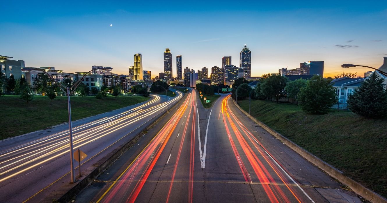 Time-lapse of travelers going to and from Atlanta, Georgia via the Jackson Street Bridge at night. 