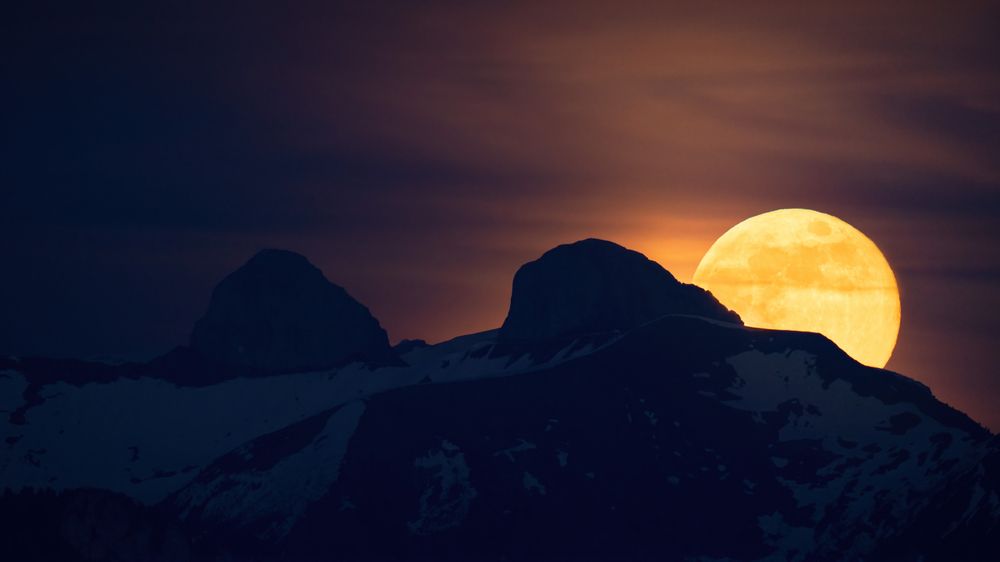 Flower Supermoon rising behind the Swiss Alps in May, Lausanne, Switzerland