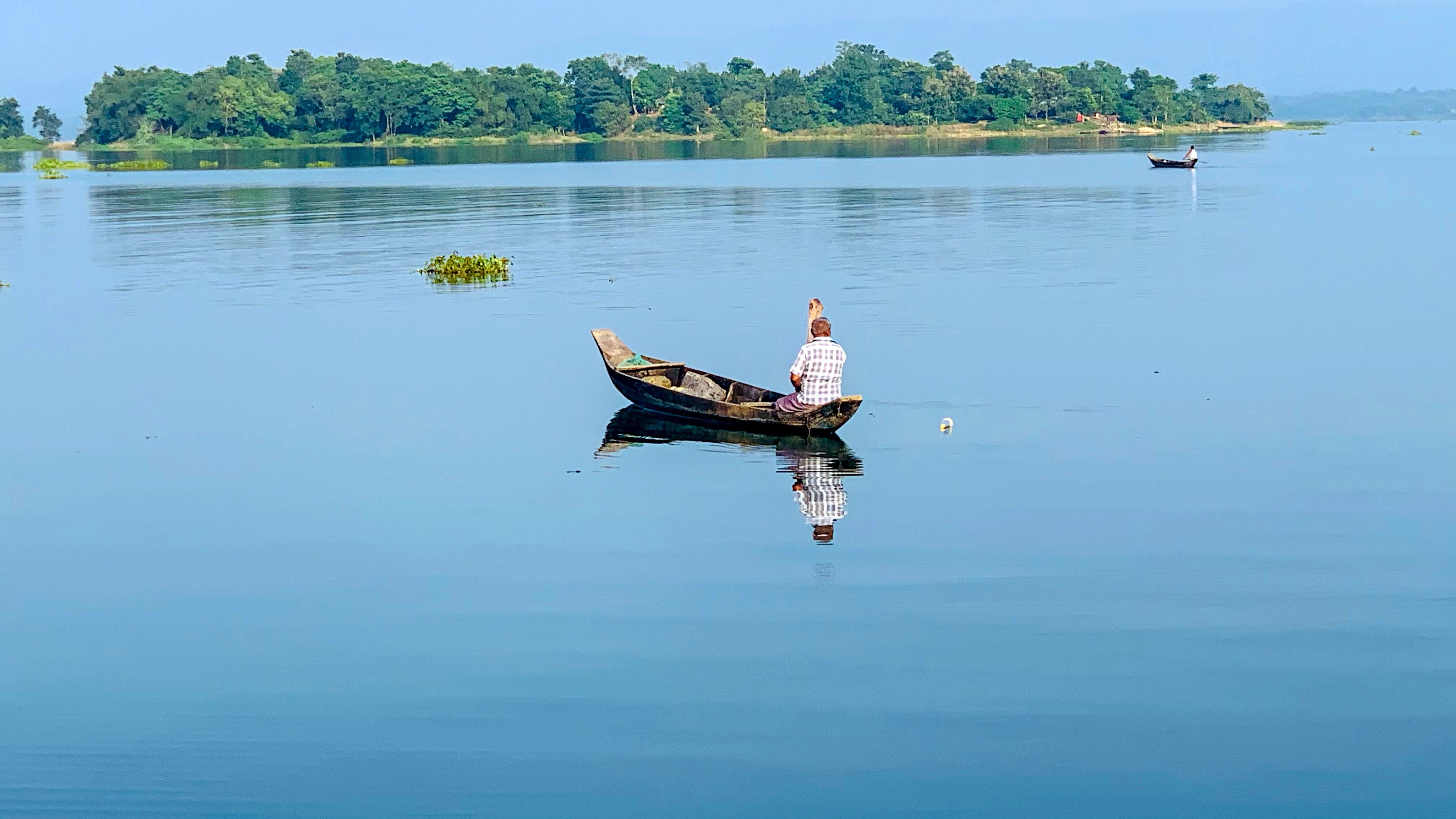 Man in a boat on the water 