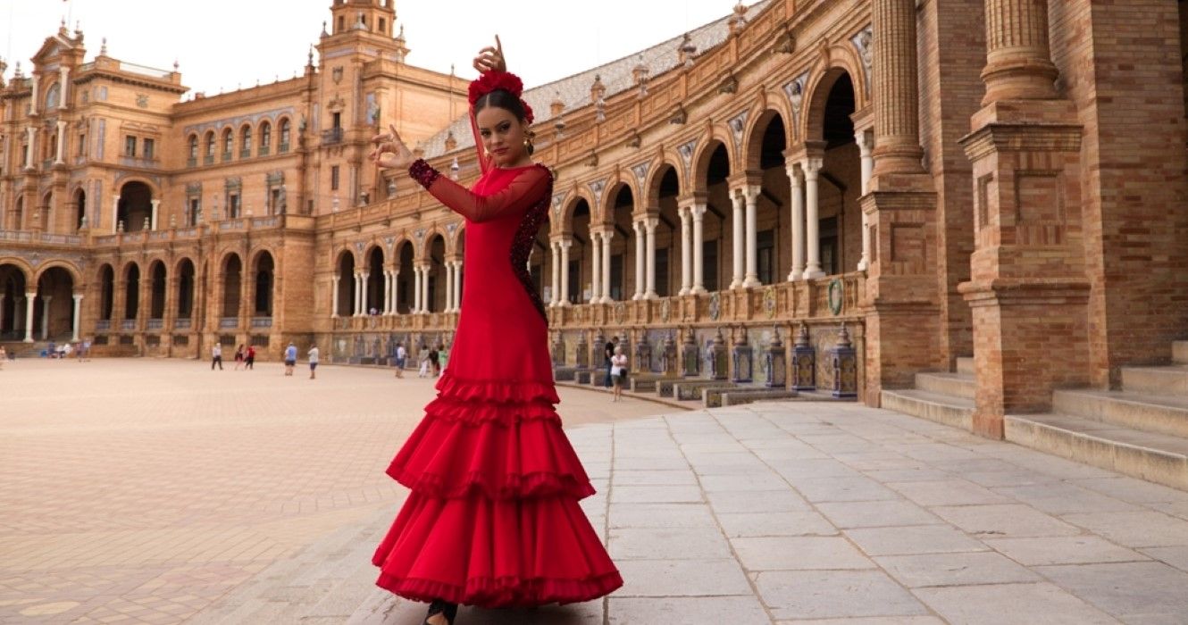 Woman dancing flamenco in a square in Seville, Spain