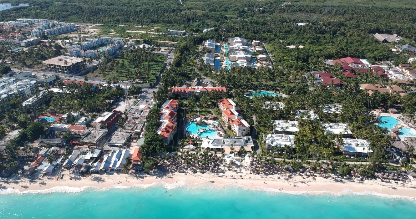 Aerial view of resorts and ocean in Punta Cana