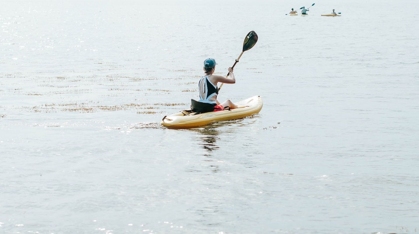 A person kayaking in Maine 