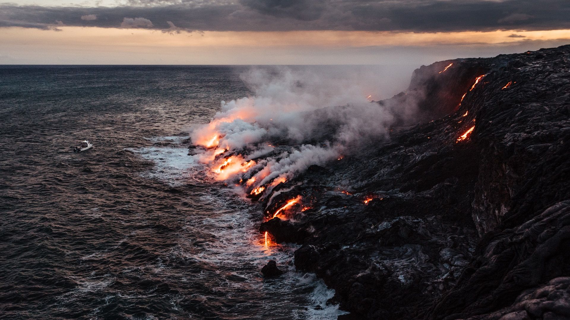 Lava from the Kilauea volcano hitting the ocean in Hawaii Volcanoes National Park