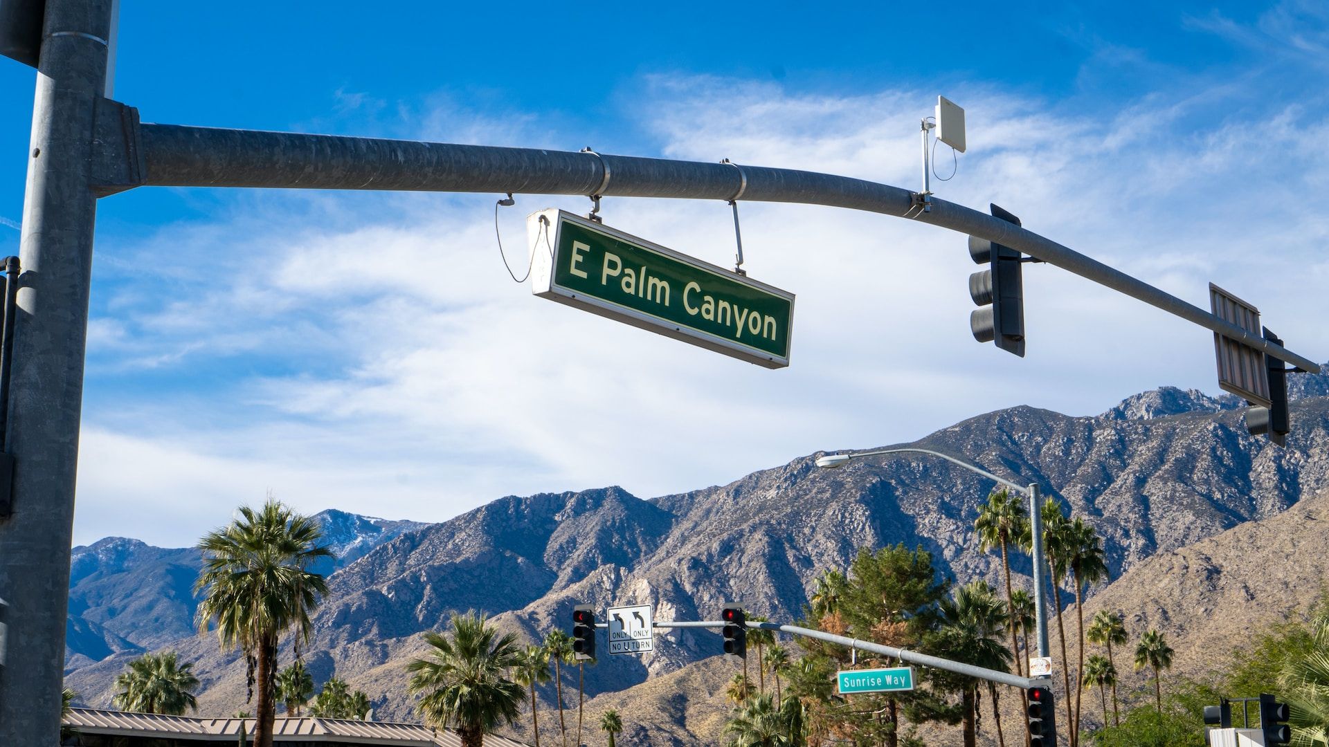 E Palm Canyon road sign in Palm Springs CA