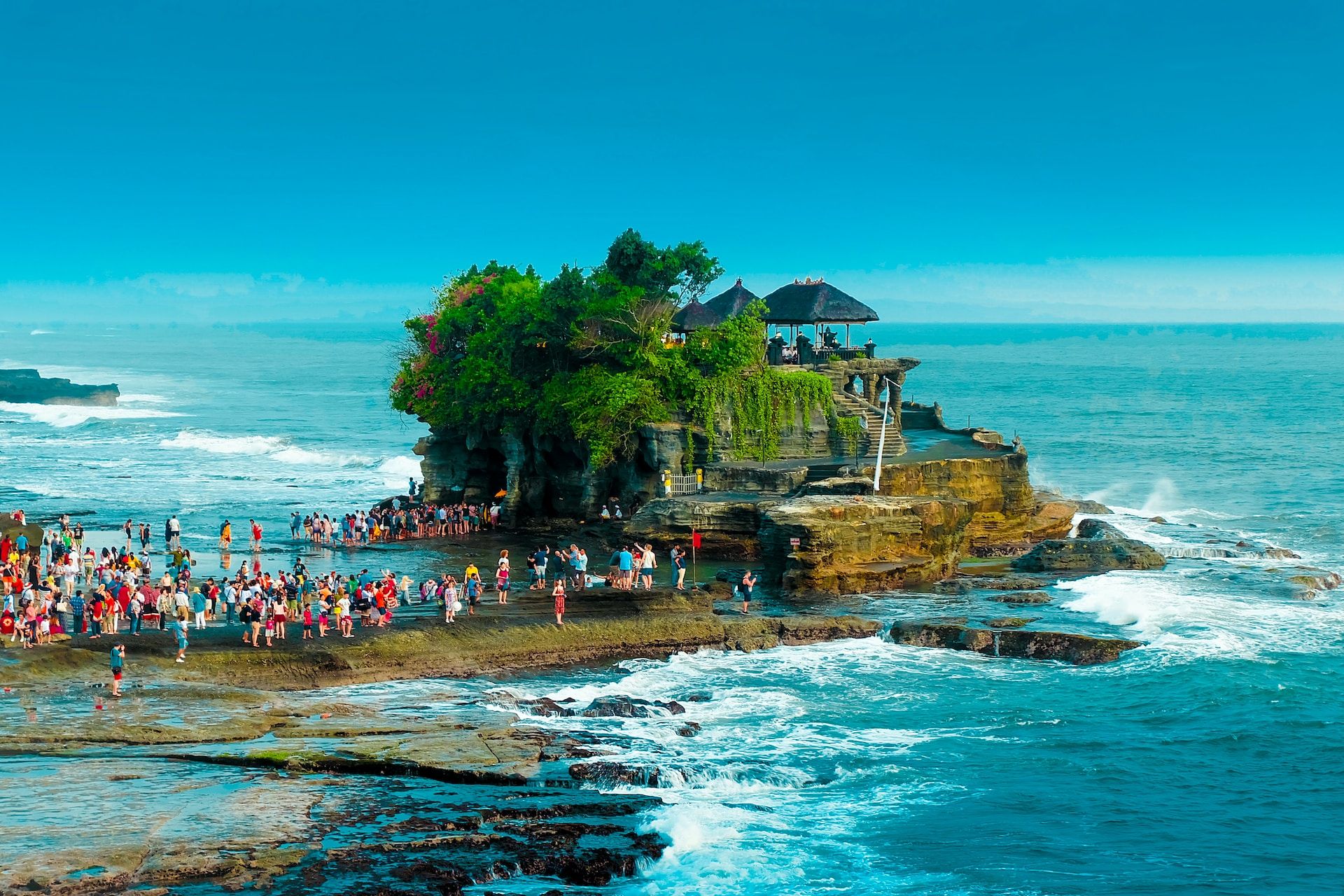 People at Tanah Lot Temple in Bali, Indonesia