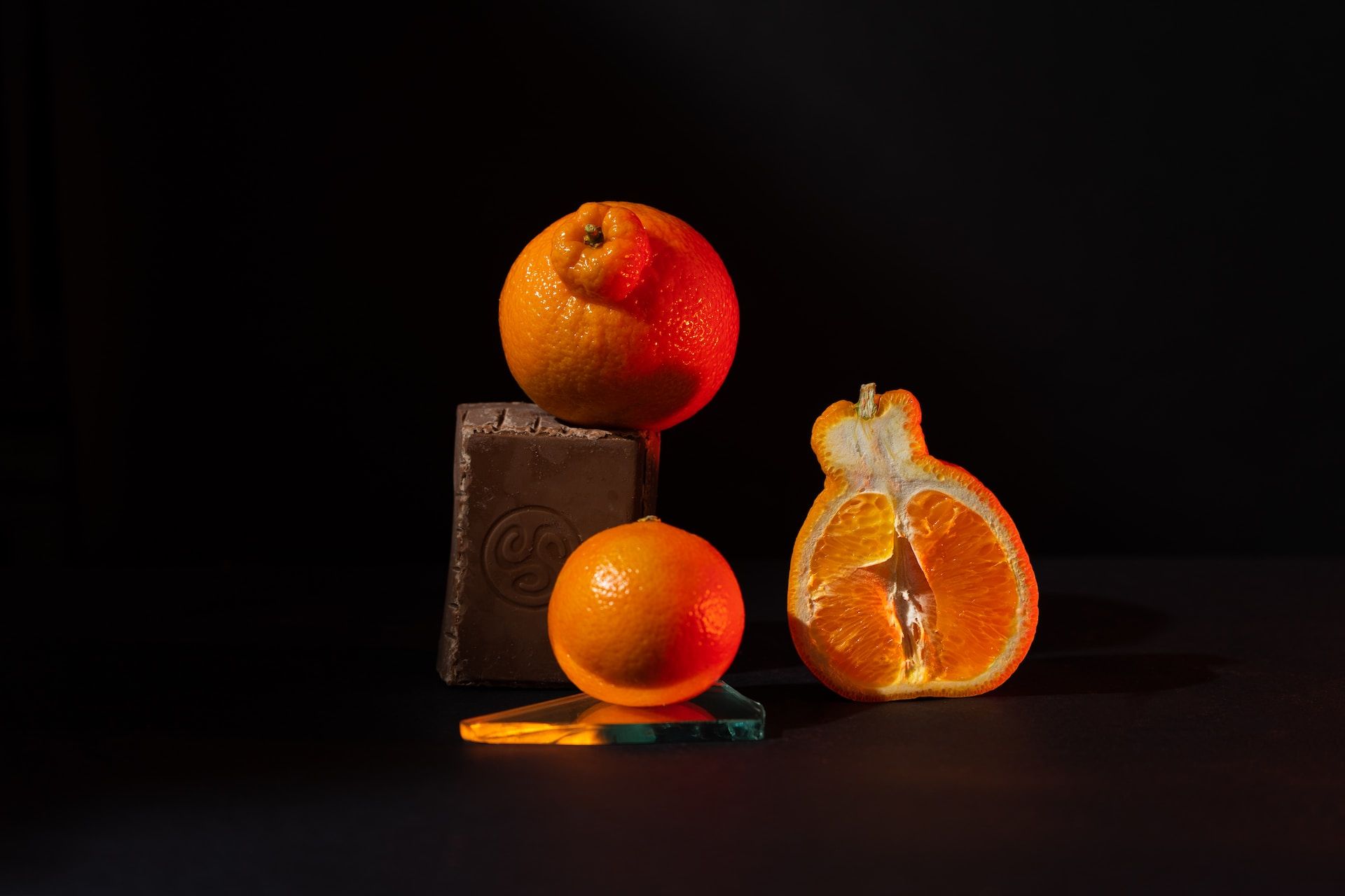 Oranges with a piece of chocolate