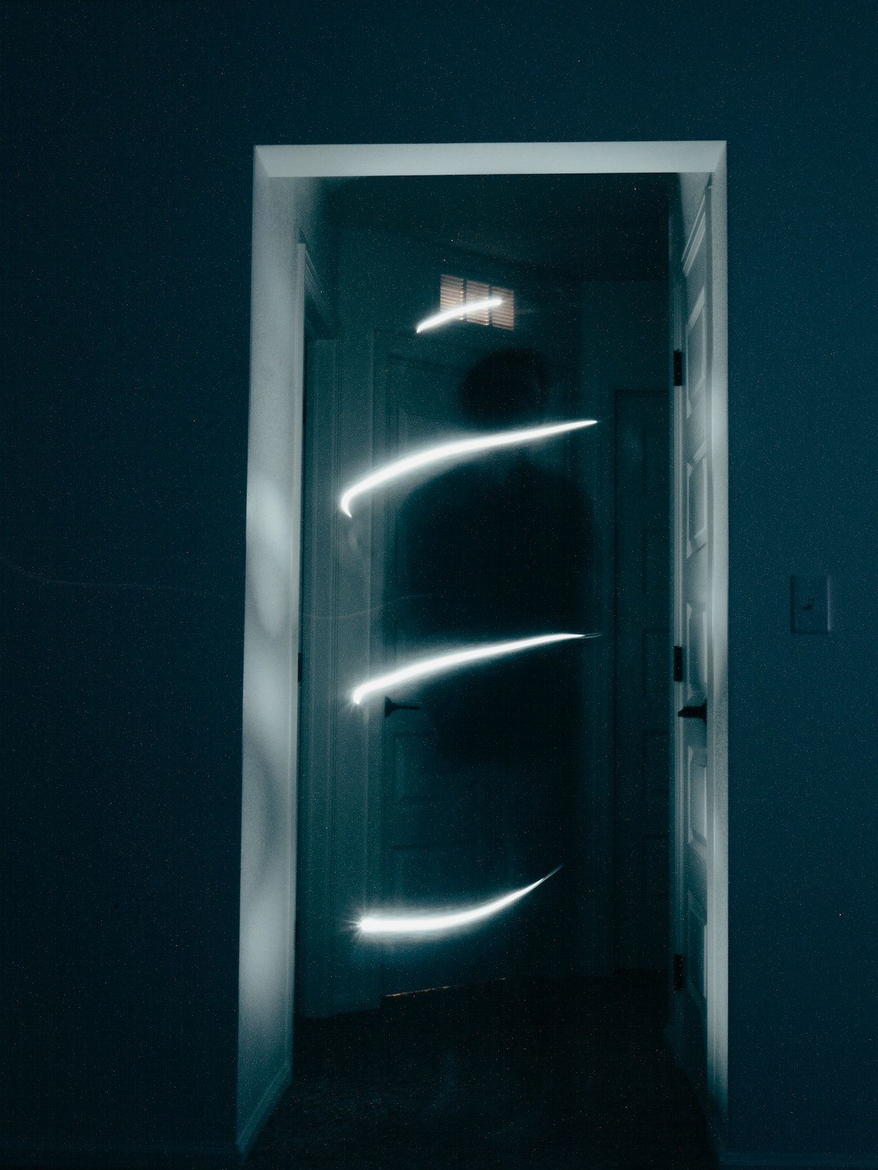 Ghostly figure in a doorway