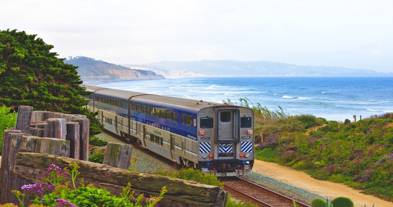 Amtrak Pacific Surfliner traveling along the coastline of San Diego, California, USA