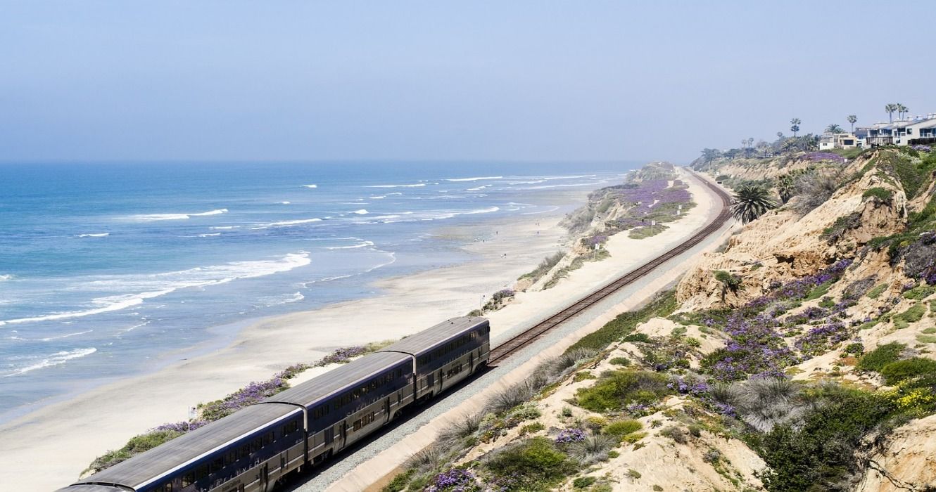An Amtrak train traveling along the West Coast in San Diego, California, USA