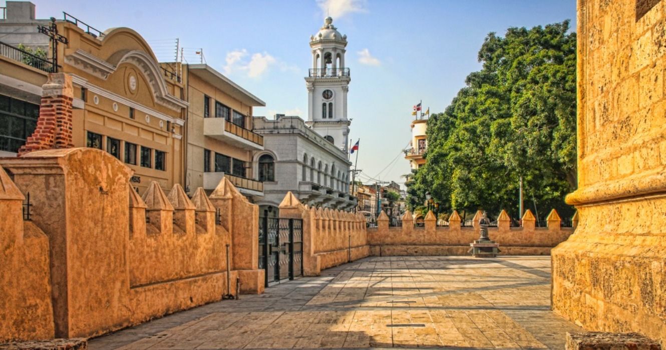 Historic City Center Plaza with Colonial Buildings and Church in Santo Domingo, Dominican Republic