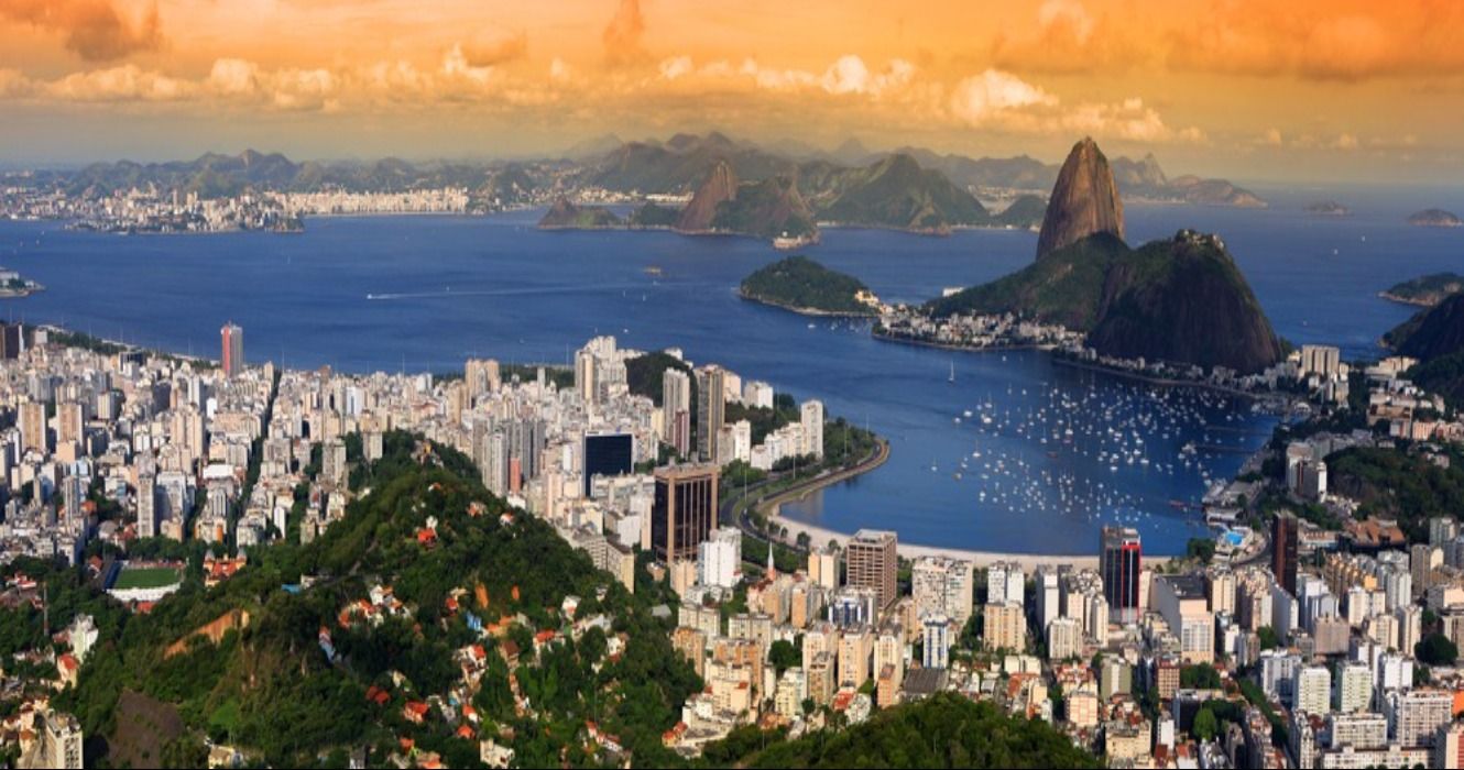A panoramic view of Rio de Janeiro in Brazil, featuring the cityscape and Sugarloaf Mountain,