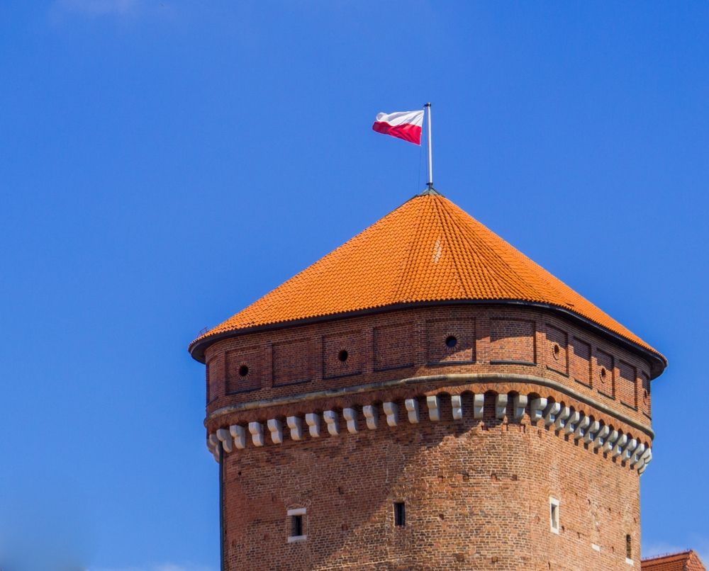 Polish flag on the Wawel Royal Castle in Krakow, Poland