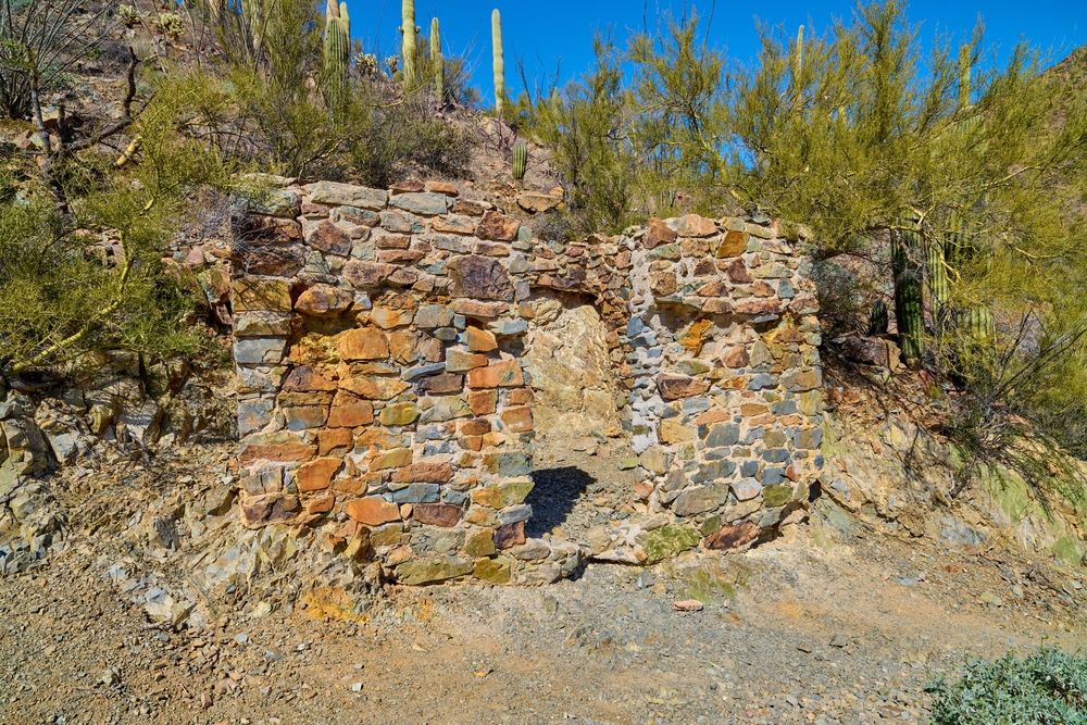 Ruined stone structure along the Gould Mine Trail in Saguaro National Park, Tucson, Arizona, USA