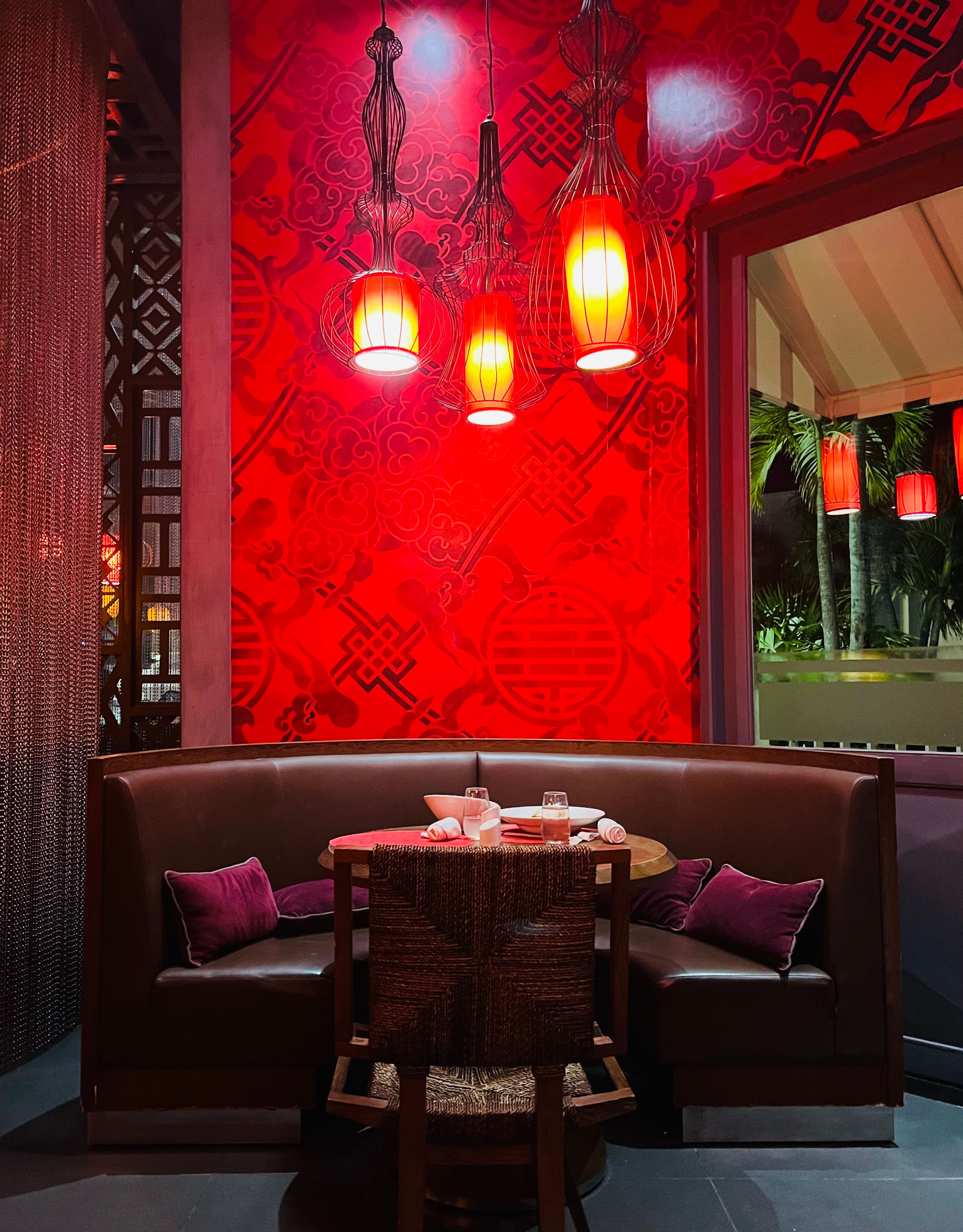Restaurant interior with red wallpaper 