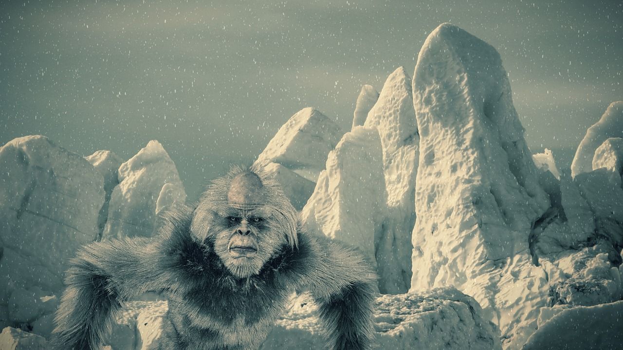Yeti in front of mountains