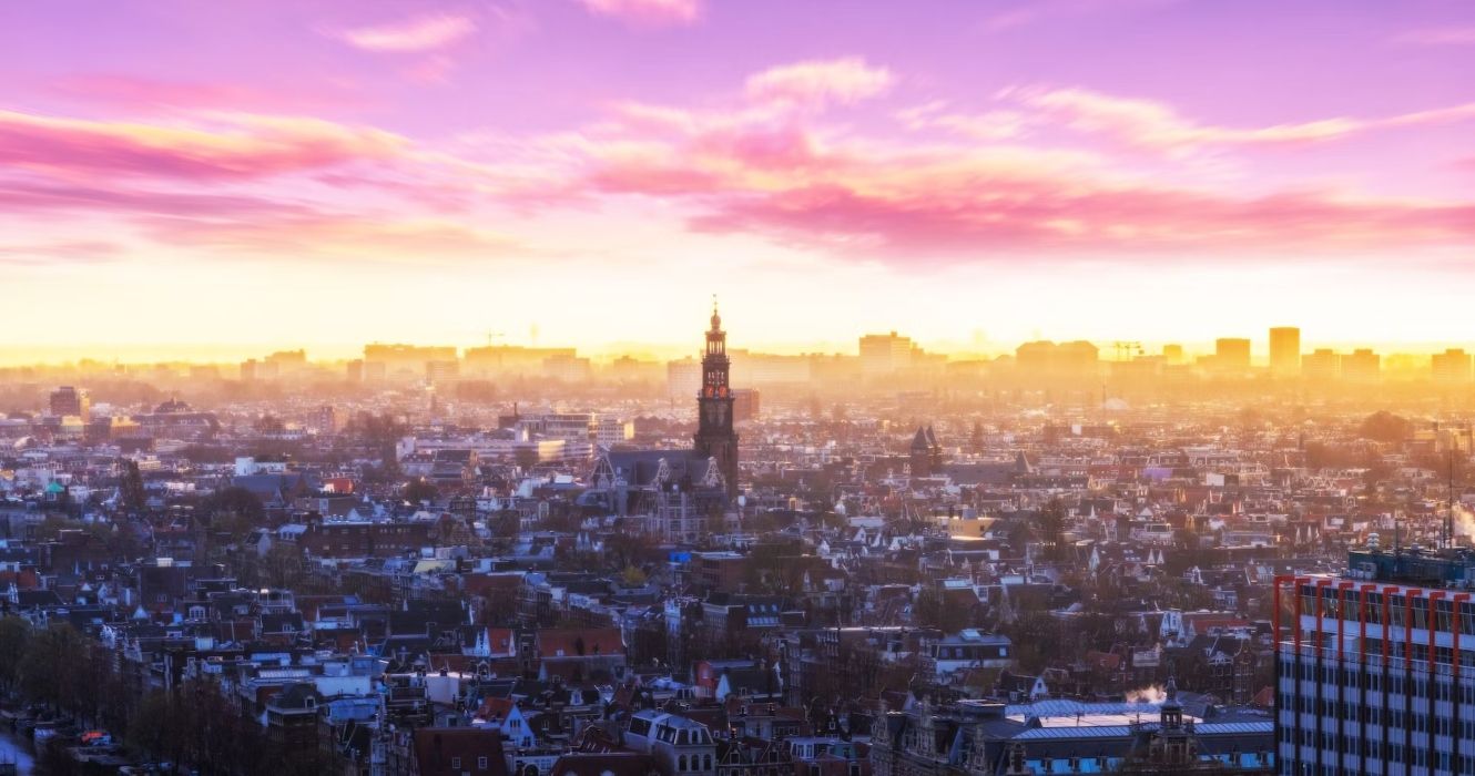 Amsterdam skyline at sunset