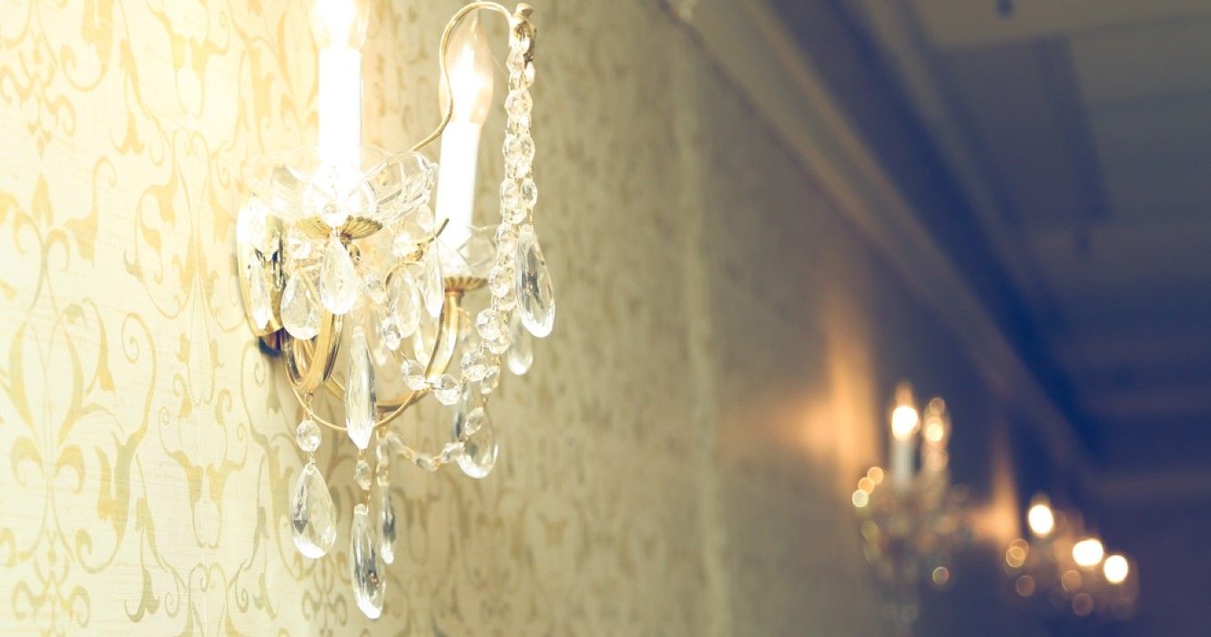 Chandelier on wall in traditional vintage themed building