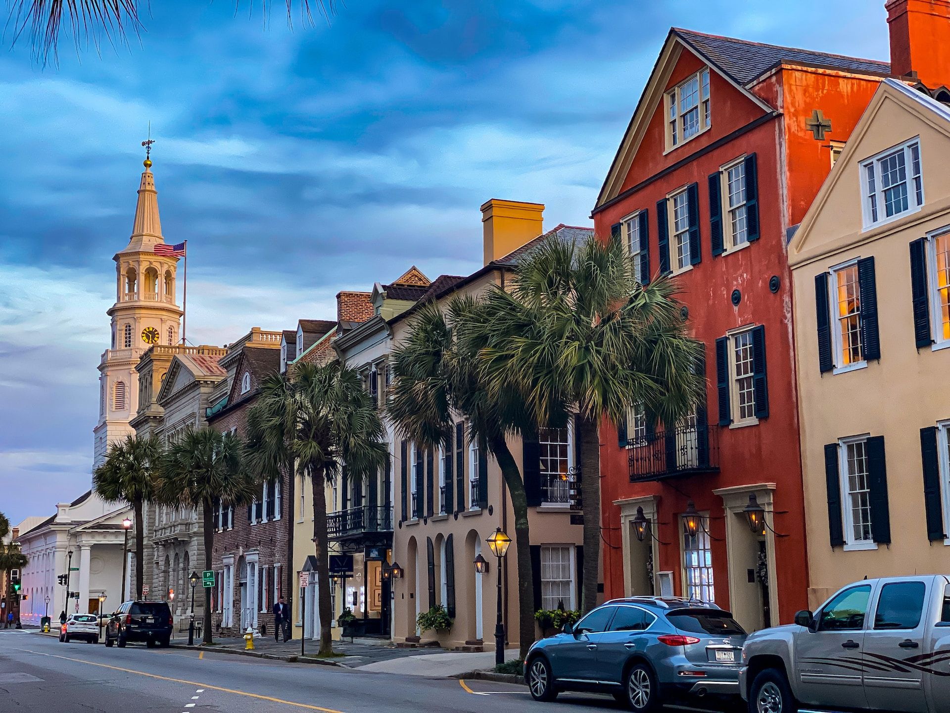 A Row Of Buildings Lined With Palm Trees In Charleston, SC.USA