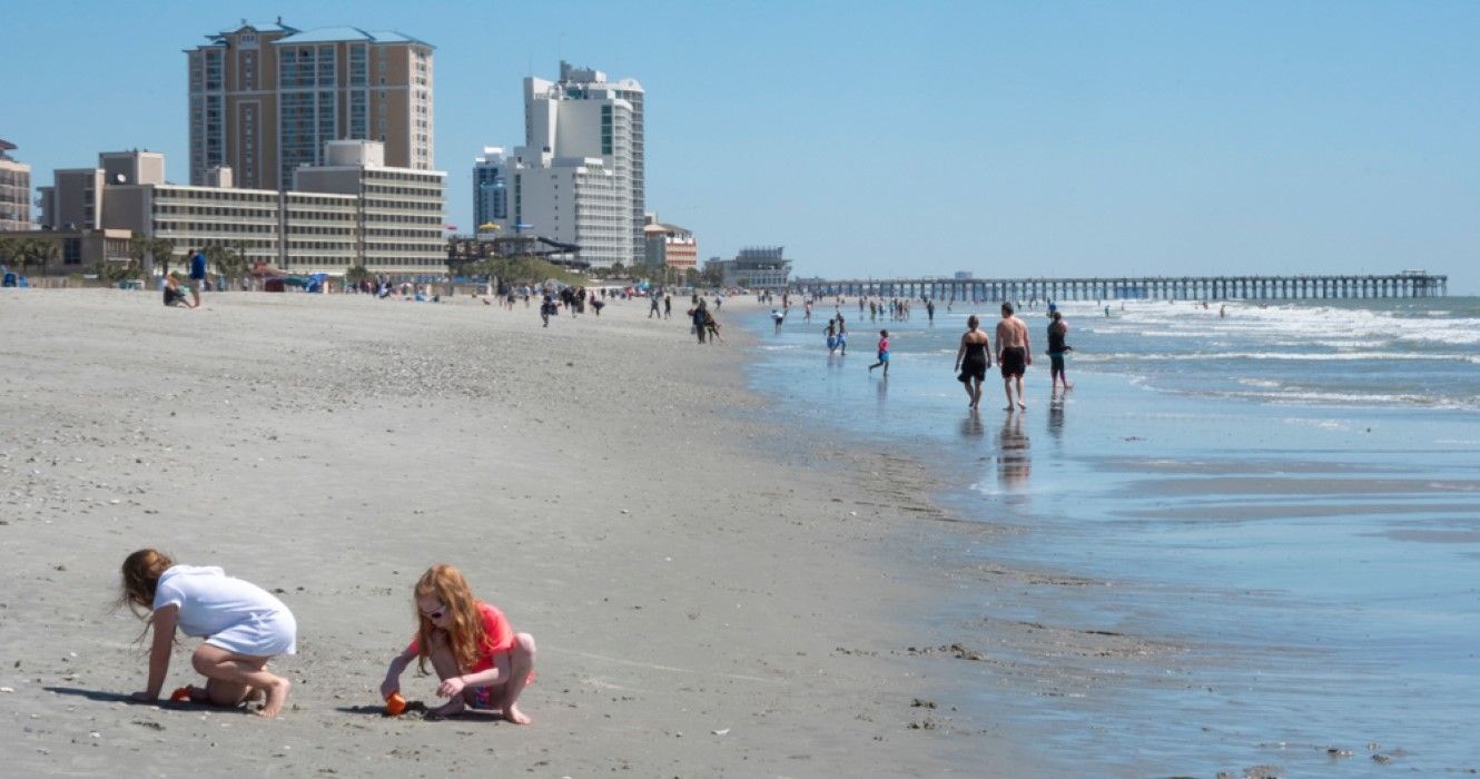 Little girls playing in the sand on Myrtle Beach, South Carolina