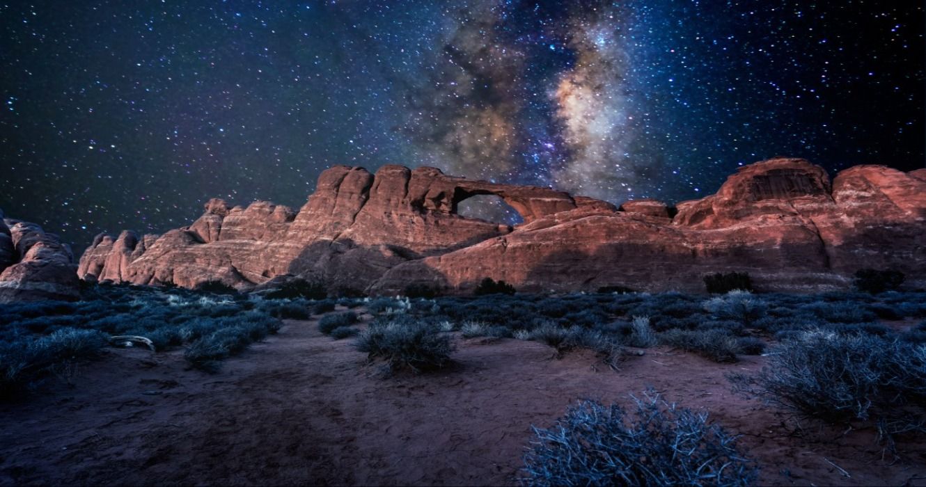 A Milky Way starry night sky in Arches National Park, Moab, Utah USA