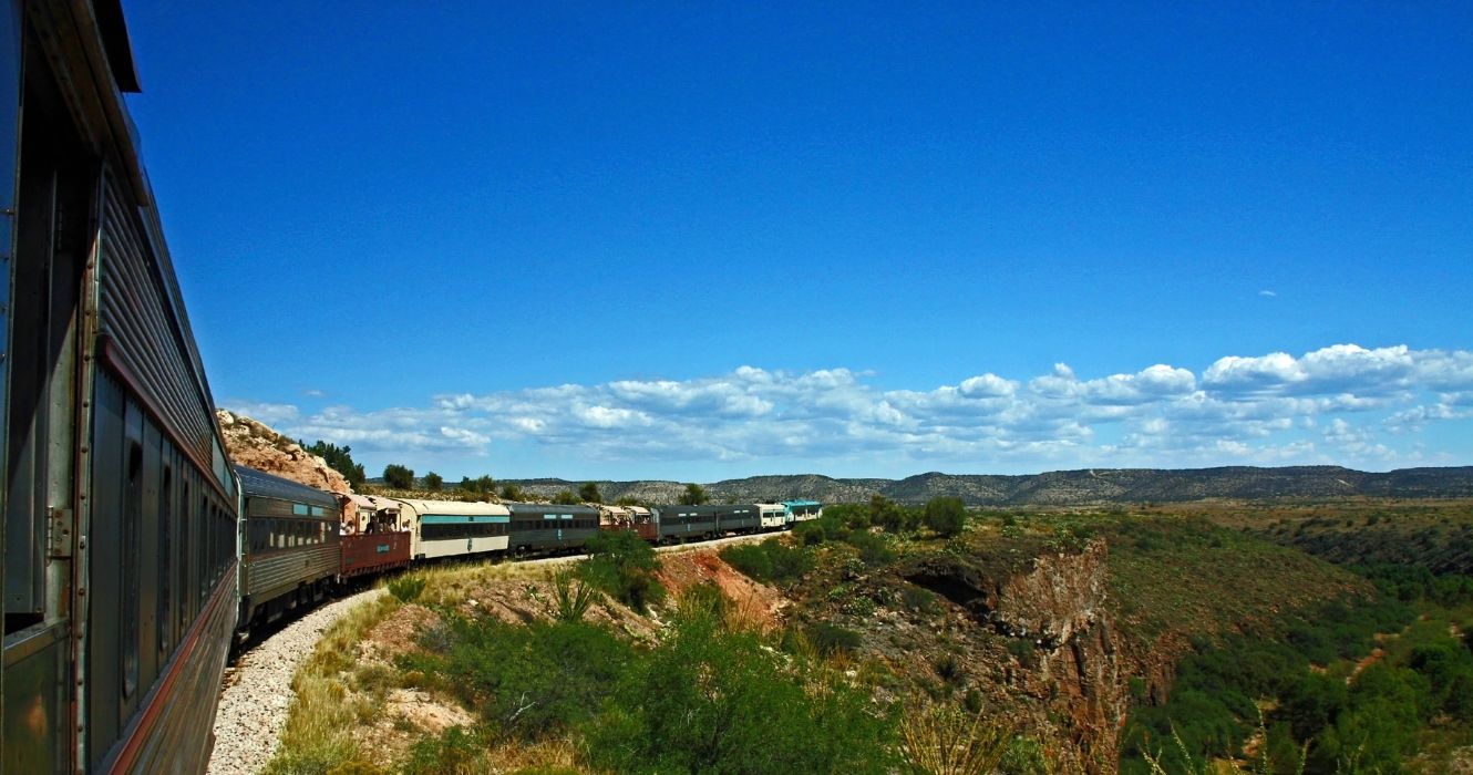 Train cars passing through Verde Canyon in Arizona