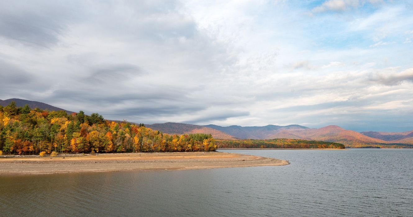 Ashokan Reservoir with Fall Colors and Dramatic Sky in the Mid-Hudson Valley New York State