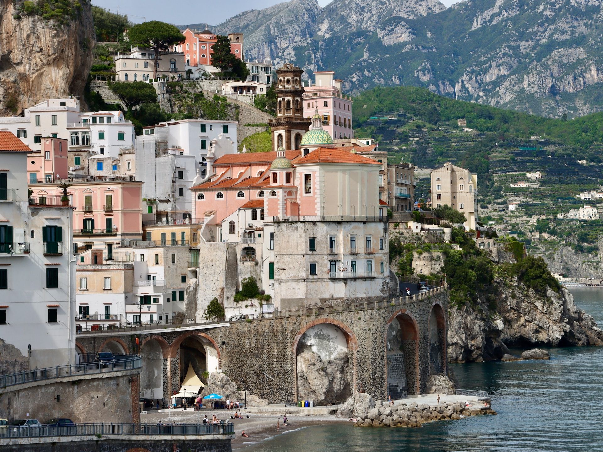Precious coastal town of Atrani hugs the cliffside in the Amalfi Coast