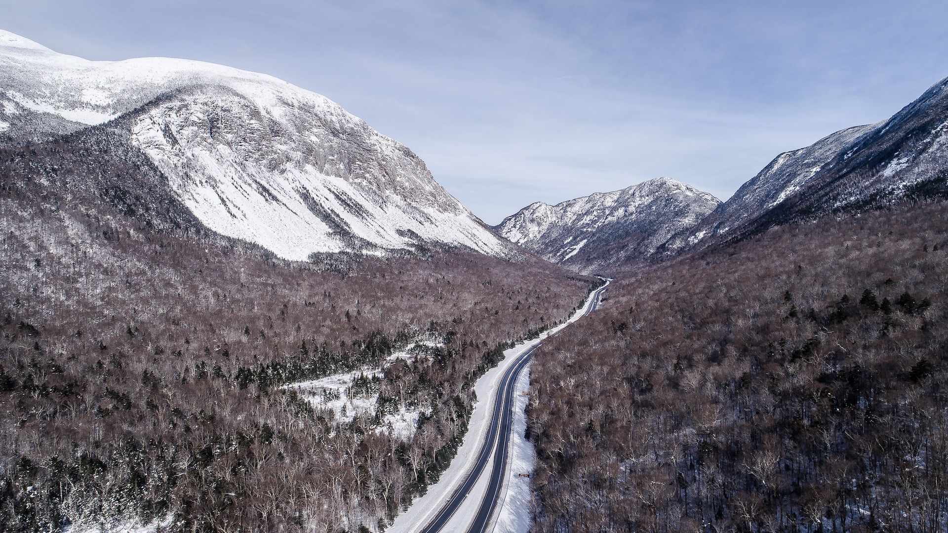 The snowy mountain area in and around Franconia Notch on a sunny winter's day, White Mountains, New Hampshire, USA