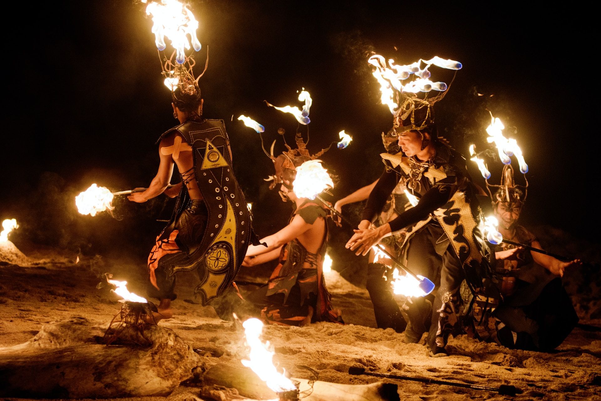 Fire dancers at night on the beach in Costa Rica