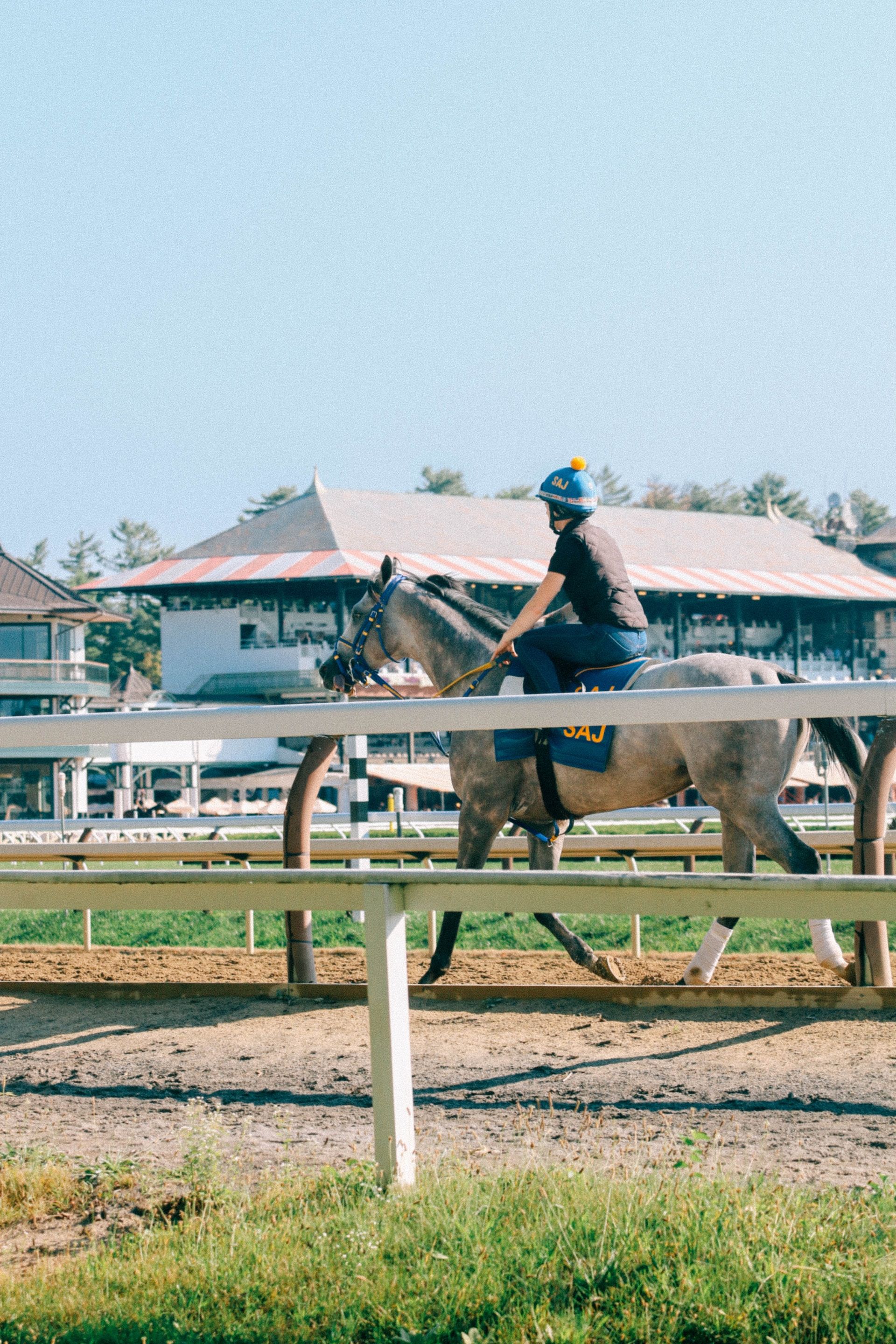 Jockey and horse on a racetrack in Saratoga Springs, New York