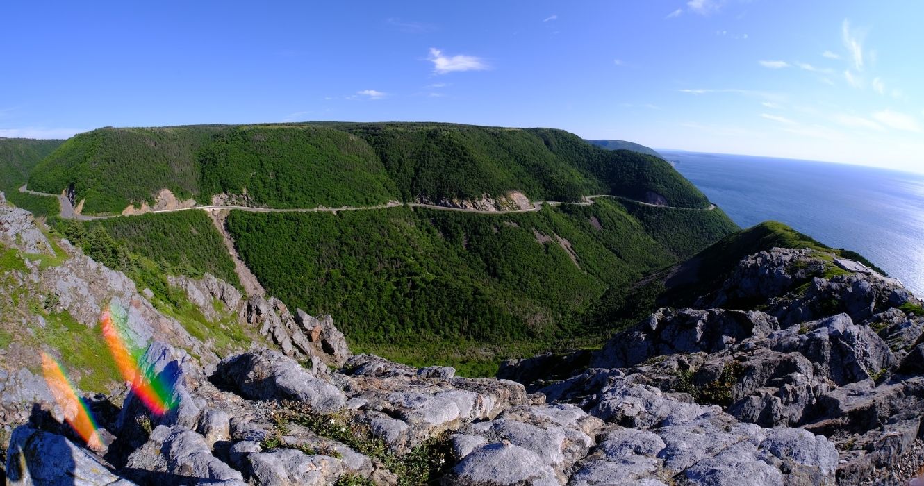 Distant view of a road along Cape Breton Island, Nova Scotia, Canada