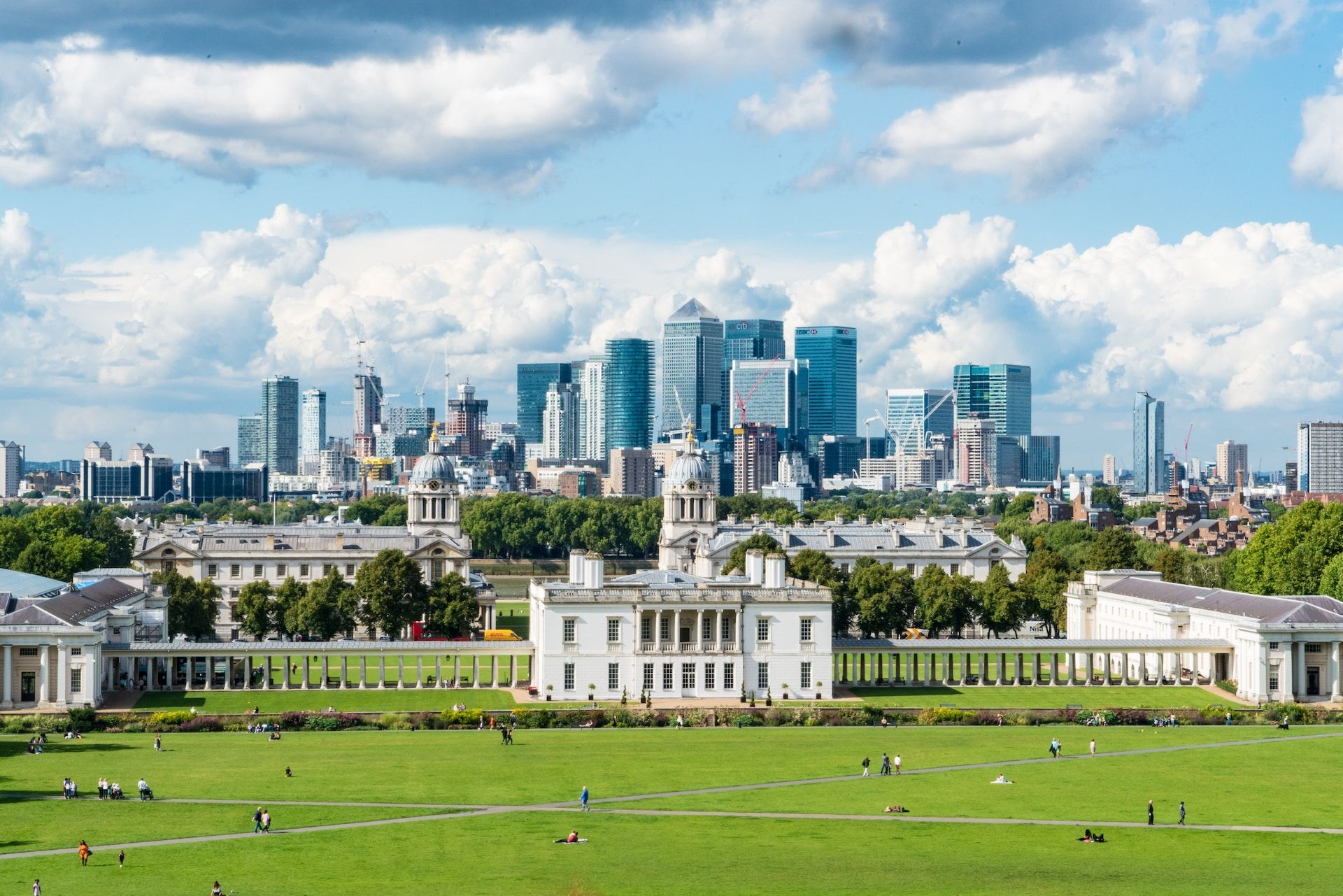 Greenwich College and tall buildings, including One Canada Square in the background, London 