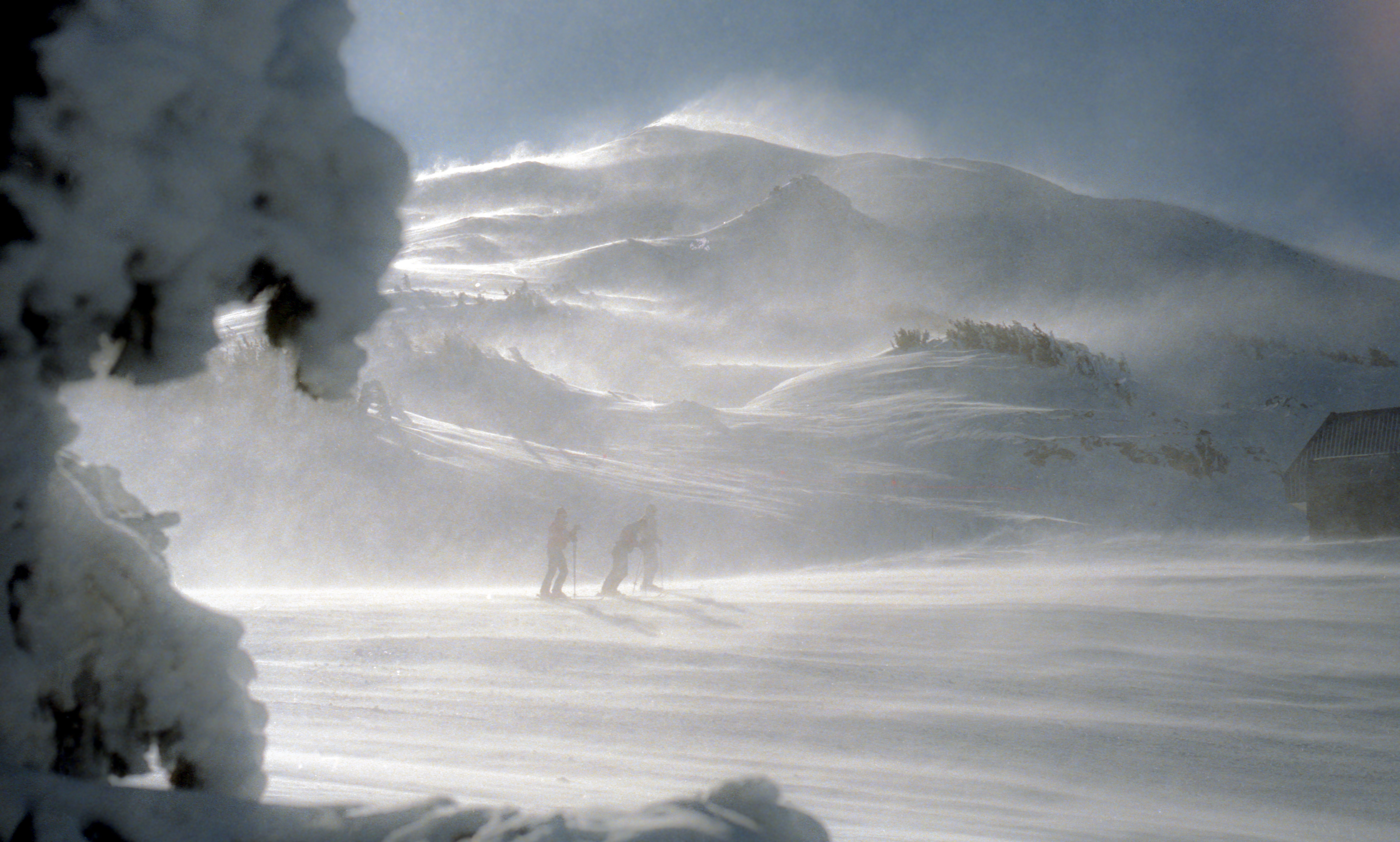 Men walking in the snow at Mount Bachelor, Oregon