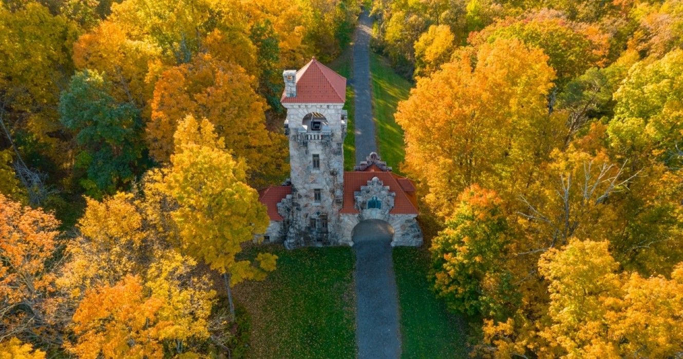 A tower in New Paltz, New York, surrounded by fall foliage, USA