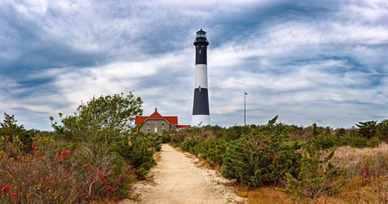 Fall foliage at Fire Island Lighthouse on the Great South Bay, Long Island, New York, USA, in the autumn