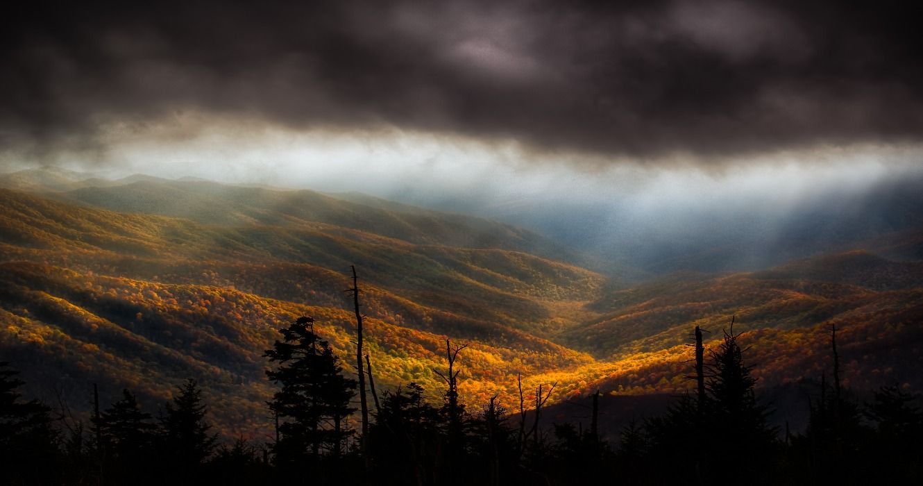 A storm breaking over fall foliage seen from Clingmans Dome, Tennessee, Great Smoky Mountains National Park, USA