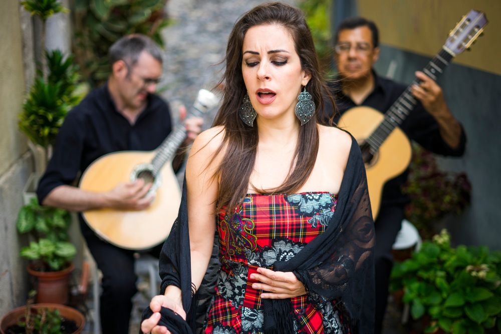 Fado band performing traditional Portuguese music on the street of Alfama, Lisbon, Portugal