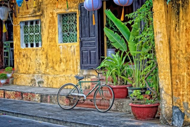 Vintage bicycle resting on a charming Vietnamese lane.