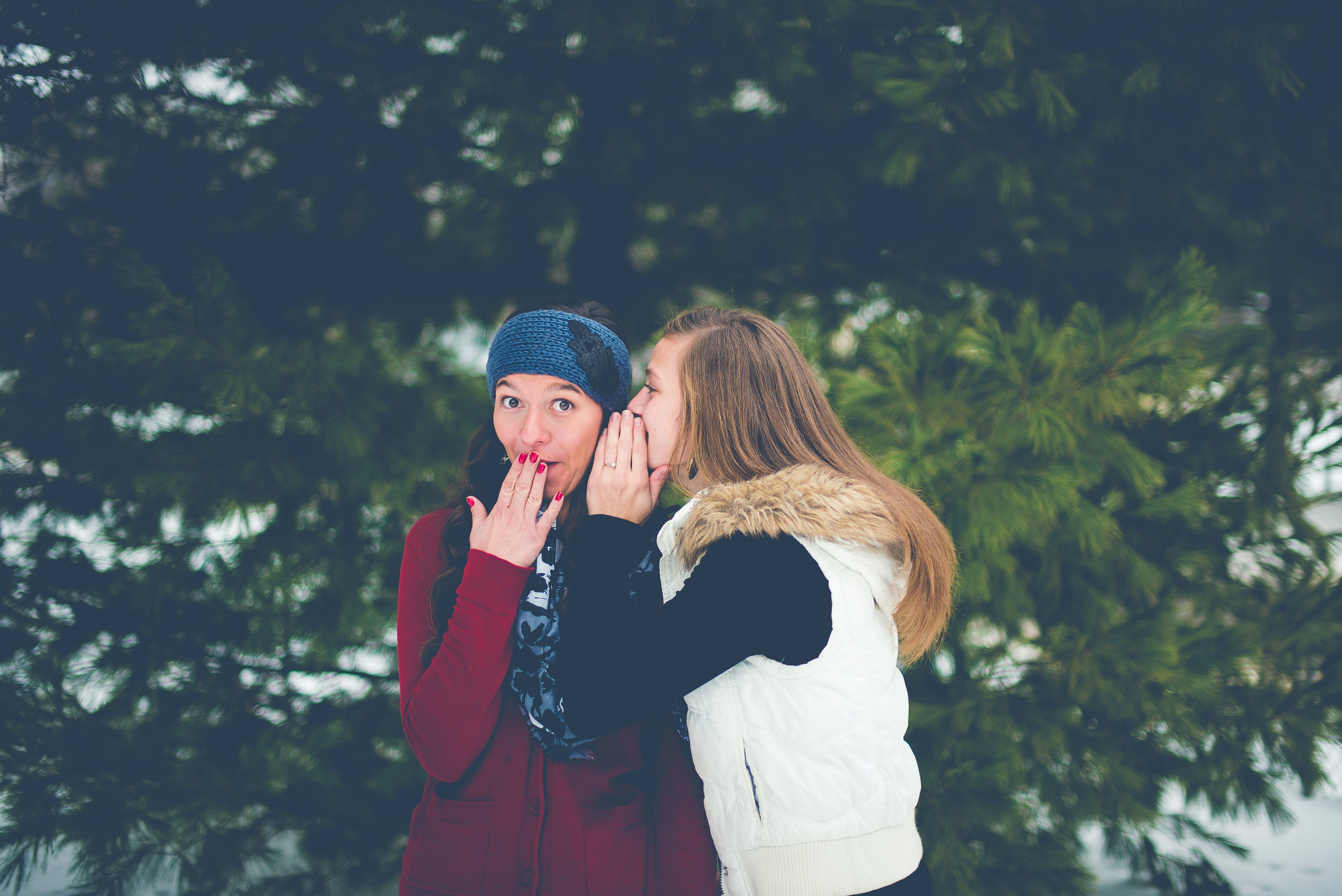 Two women gossiping