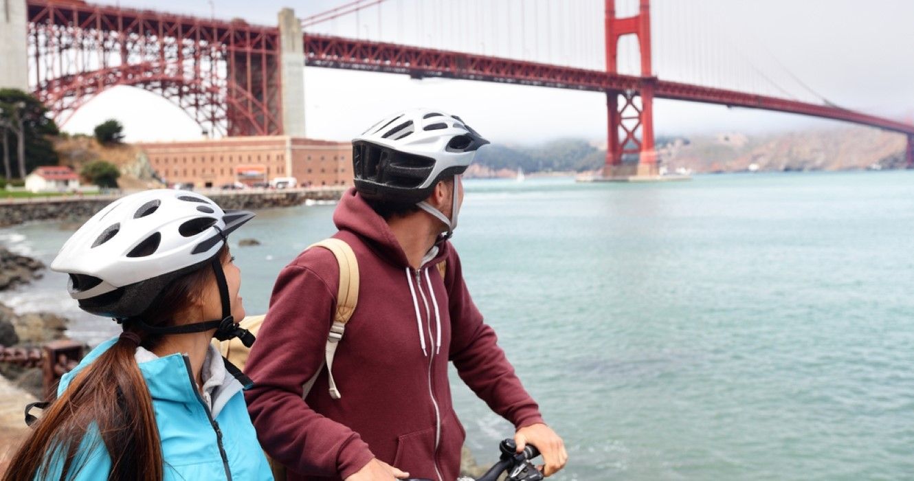 Biking couple sightseeing in San Francisco, California