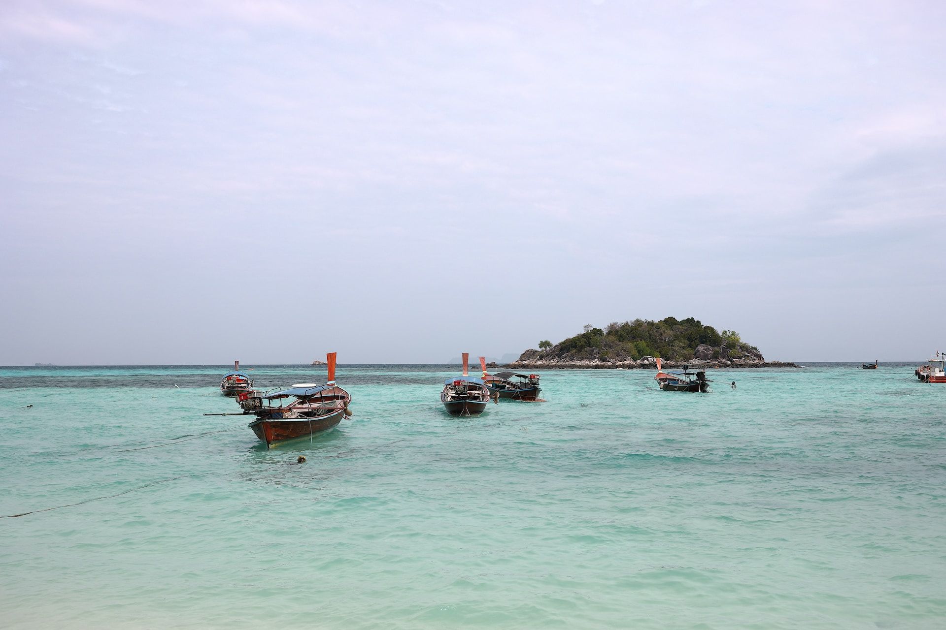 Boats moored offshore on Koh Lipe Island