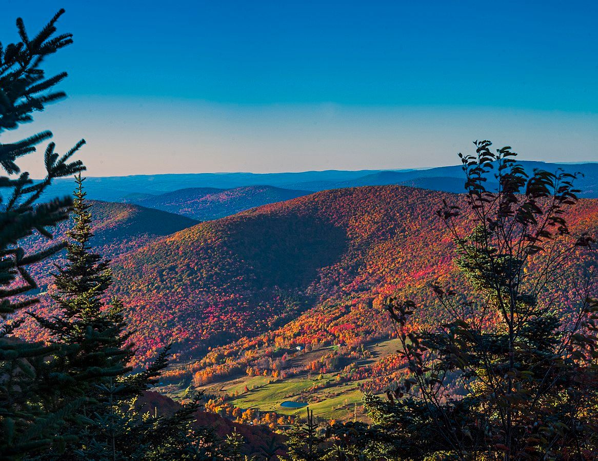A view of the Catskill Mountains in the Catskills region of New York featuring fall foliage, USA
